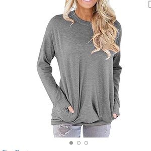 Tunic blouse round neck with pockets